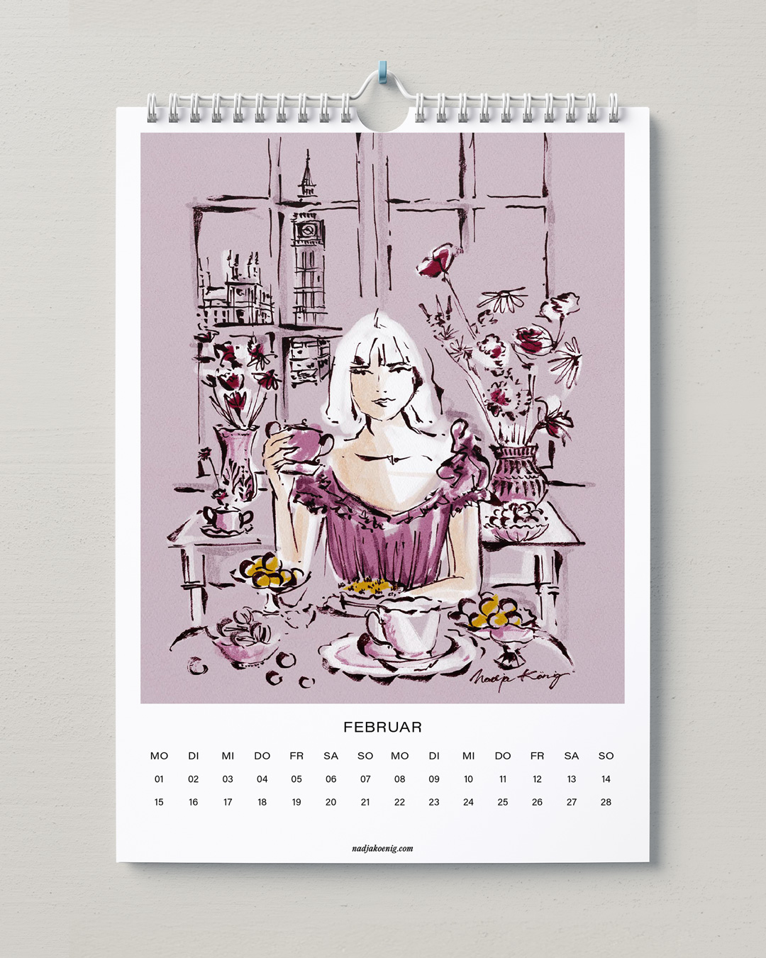Wandkalender 2027 von Nadja König, Februar: Frau mit Teetasse an einem gedeckten Tisch vor großen Fenstern